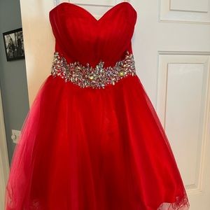 Red cocktail dress. Worn as opening number for pageant.